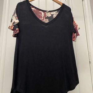 Black flowy top with floral flutter sleeves